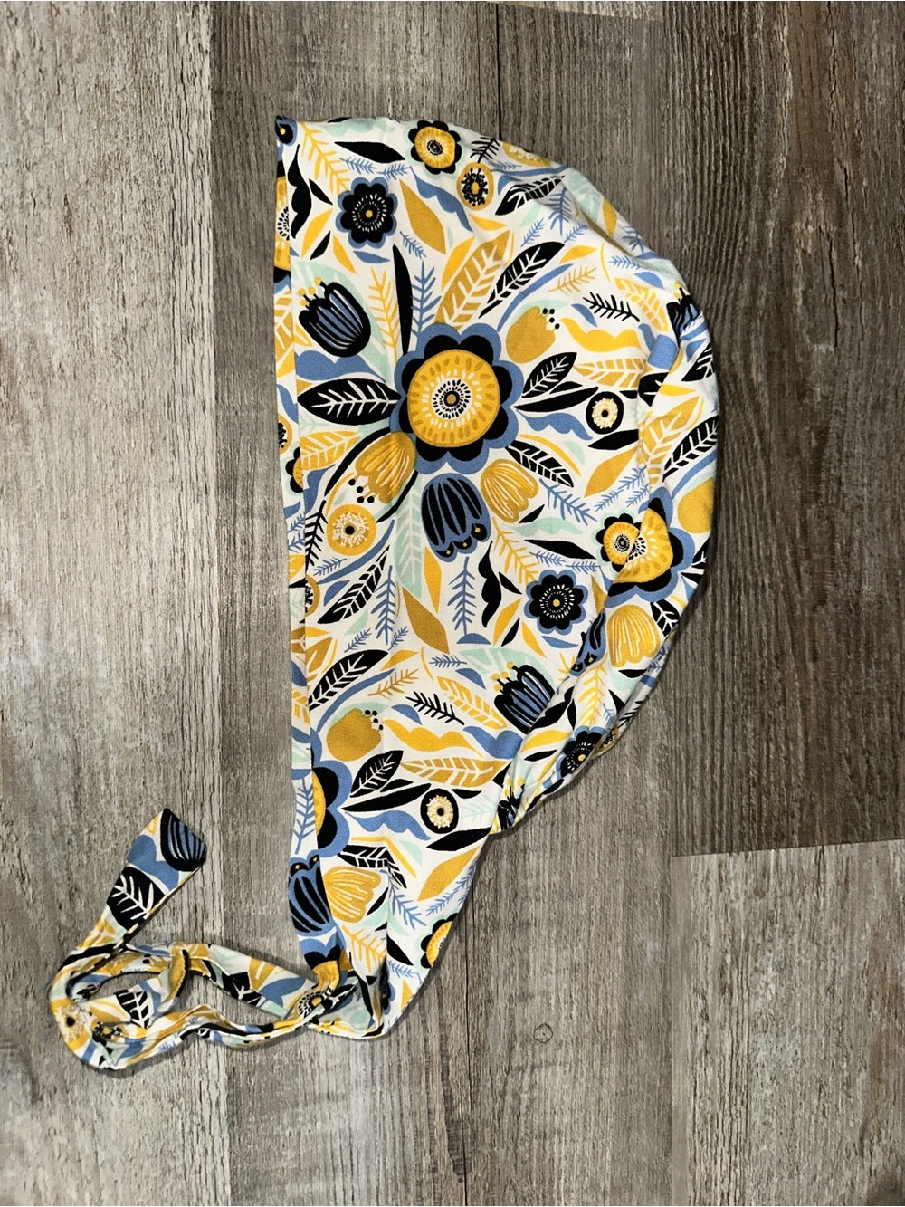 Floral pattern tie-back surgical cap